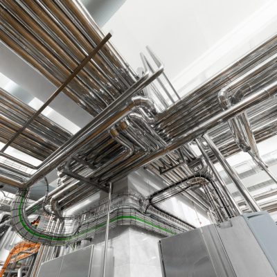 steel-pipelines-cables-factory-interior-as-nuclear-industry-background-concept